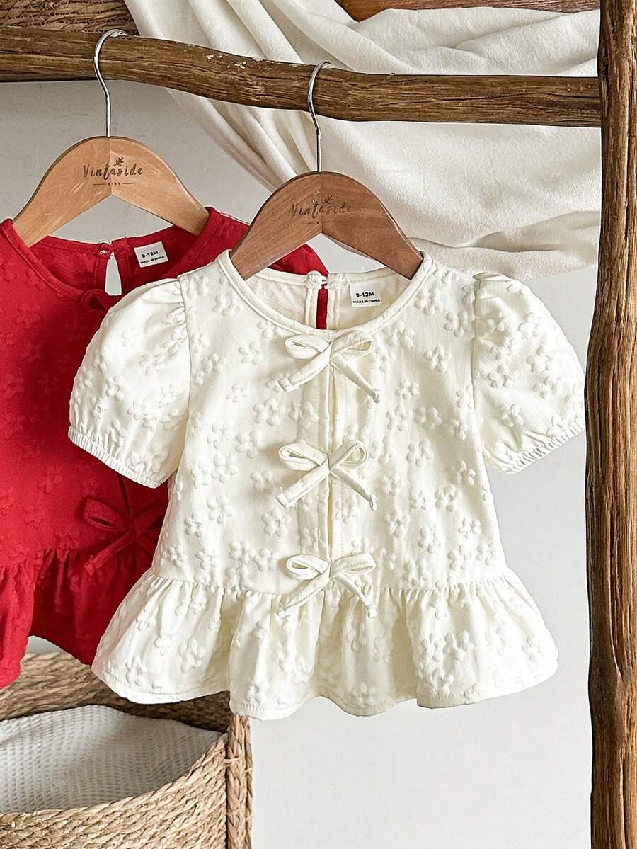 SHEIN Vintaside Kids 女婴衬衫,采用独特的印花面料,乡村度假风格,可爱时尚,适合春夏穿着,饰有蝴蝶结。 - 杏色 - 查看 1