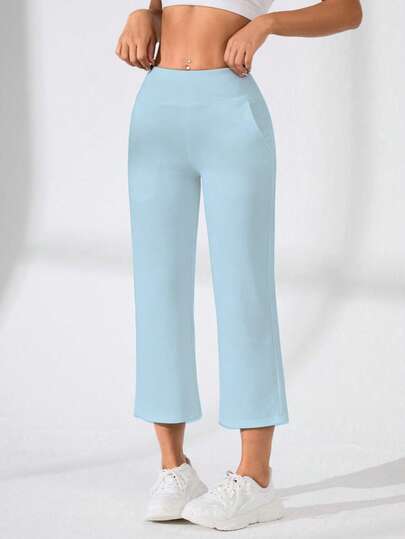 Easithlete Quần legging casual màu trơn, thiết kế tối giản với túi hai bên.