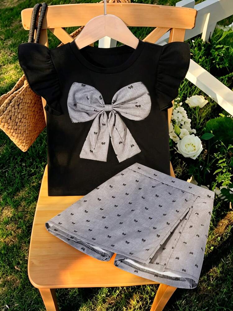Elladie kids Bộ 2 món cho bé gái 4-7 tuổi: Áo tay ngắn đính hạt cườm và nơ xinh xắn, quần short xẻ tà đính hạt cườm cạp chun, thích hợp mặc hàng ngày, dự tiệc và các dịp khác. - màu đen - Xem 2