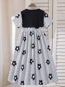 SHEIN 这款少女条纹碎花连衣裙采用经典的黑白竖条纹面料，搭配俏皮的黑色碎花图案，尽显清新青春气息。衬衫领设计搭配前襟纽扣，方便穿脱，更添学院风范；收腰剪裁凸显身材曲线，宽松的A字长裙飘逸灵动，并附赠可拆卸黑色披肩，营造柔美气质。 - 黑色 - 查看 7