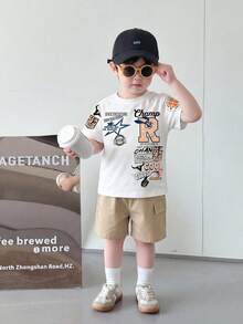 SHEIN 2 Peças Conjunto de Roupa de Verão para Bebê Menino, Top de Manga Curta com Gola Careca e Estampa de Letra Cartoon Branca, e Shorts Lisos, Roupas Casuais e Elegantes para Passeio na Cidade para Bebê Menino - Damasco - Visão 7