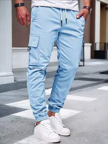 Manfinity Homme 男士成熟休闲多口袋工装裤，适合日常休闲穿着、周末外出、旅行、朋友聚会等场合。这款裤子是男士衣橱中不可或缺的百搭单品，也是送给男友或丈夫的绝佳礼物。 - 藍色 - 查看 4