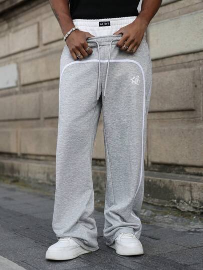 PAVTROS Pantalones deportivos casuales con cremallera y estampado de letras para hombres, con diseño minimalista de bloques de color, ropa urbana juvenil, corte holgado y versátil