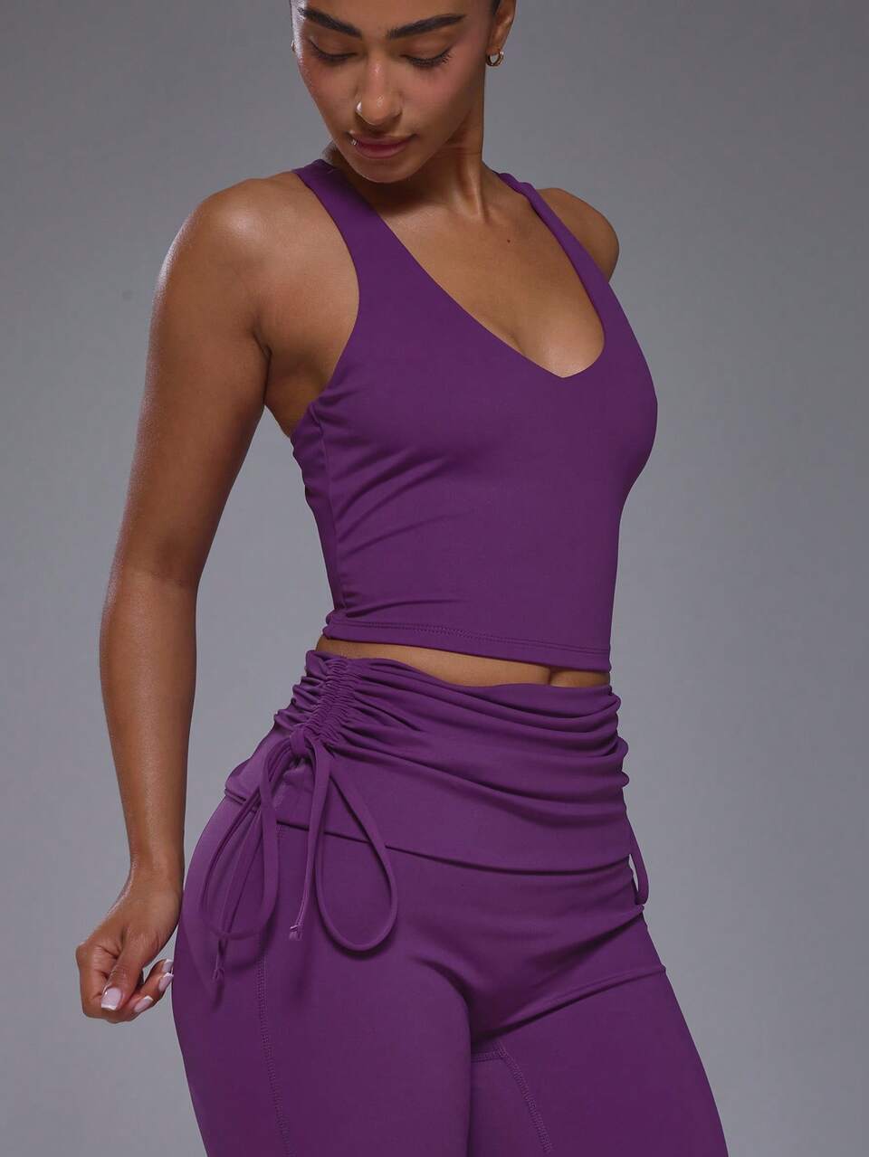 Active Purple Plunge V Neck Racer Back Cropped Top With Ruched Tie Side Foldover Waist Fitted Flare Leggings