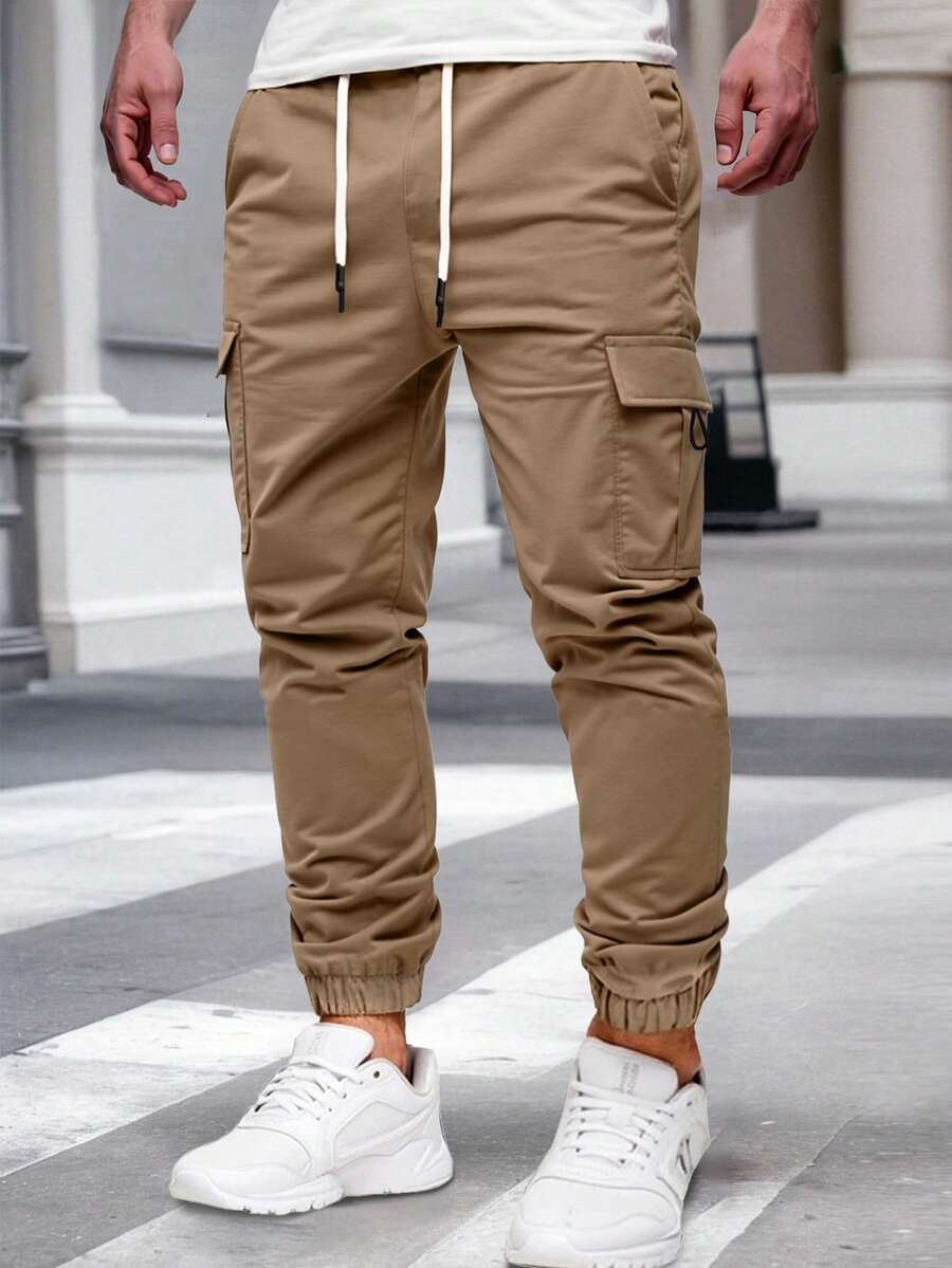 Manfinity Homme 男士成熟休閒多口袋工裝褲，適合日常休閒穿著、週末出遊、旅行、朋友聚會等。這款褲子是男士衣櫥中不可或缺的多功能單品，也是送給男朋友或丈夫的絕佳禮物。 - 棕色 - 查看 1