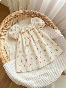 SHEIN Đầm ngắn tay ngắn thắt nơ màu xanh lá cây dễ thương cho bé gái, thích hợp cho kỳ nghỉ hè. - Nhiều màu - Xem 1