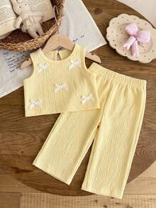 SHEIN 2件組嬰幼兒女童可愛夏季套裝 淡黃色無袖3D蝴蝶結背心上衣 & 寬腿長褲套裝 家庭穿搭波希米亞度假服 - 黃色 - 查看 8