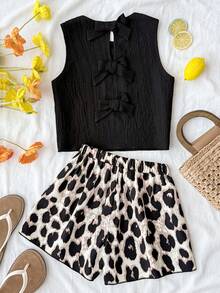 SHEIN Tween Girls 2pcs/Set Black Summer Cute Vacation Holiday Daily Wear Solid Woven Textured Round Neck Bow Back Crop Top And Leopard Shorts Set,Casual - Blue - View 3