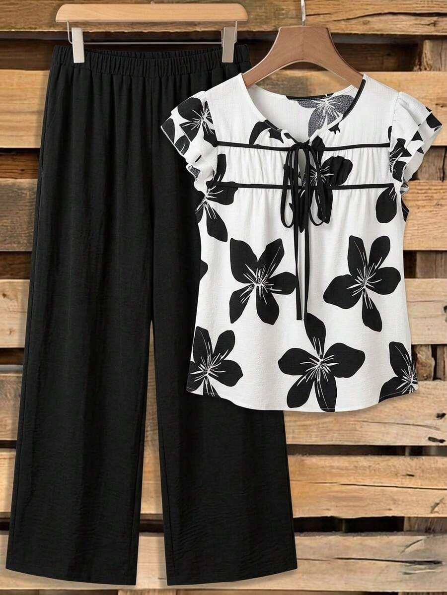 Comfylo Conjunto de 2 piezas de blusa con estampado floral y pantalón de unicolor talla grande - Blanco y Negro - Ver 1