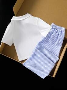 SHEIN 女童休闲两件套。V领翻领Polo衫搭配蓝白竖条纹阔腿裤。饰以经典小马刺绣，简约清新，尽显学院风，是春夏日常穿着和外出活动的理想之选。 - 藍色 - 查看 2