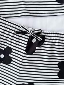 SHEIN 2pcs/Set Girls Striped Floral Print Knit Asymmetric Shoulder Top And Ultra Low Waist Skinny Shorts, Suitable For Summer, Holiday, Party, Beach Casual - Black and White - View 5