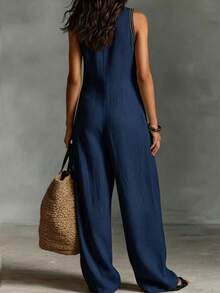 SHEIN Holidaya Bộ jumpsuit không tay mới dành cho nữ, màu be, với họa tiết hoa và thiết kế ống rộng, phong cách boho chic, thích hợp cho kỳ nghỉ biển, dạo chợ, chất liệu thoải mái và thanh lịch, đa năng cho các hoạt động hàng ngày và những chuyến đi ngắn ngày. - Màu xanh hải quân - Xem 2