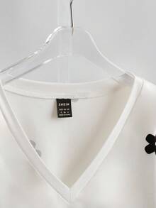Qadelle Áo nỉ dệt kim cổ tròn tay raglan họa tiết hoa đính hạt thời trang thường ngày cho nữ mùa thu - Đen và trắng - Xem 3