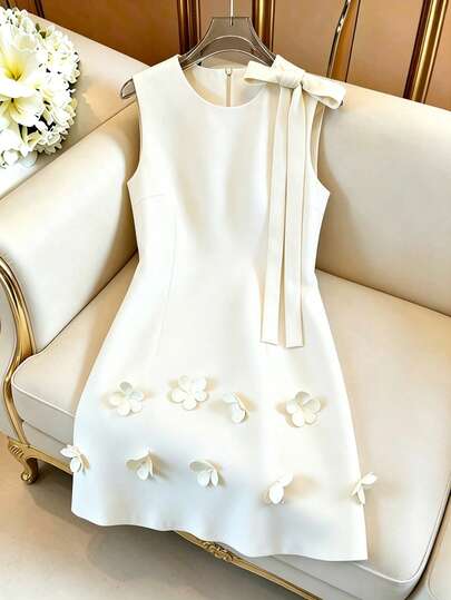 Qadelle Vestido sin mangas con diseño de pétalos florales elegante francés, vestido blanco de mujer con lazo y diseño de flores 3D para primavera/verano, adecuado para salidas diarias, citas, fiestas, graduaciones, vacaciones