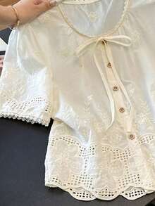 Resyla Countryside Style Embroidered Hollow Lace-Up Short Sleeve Cropped Blouse For Women - White - View 4