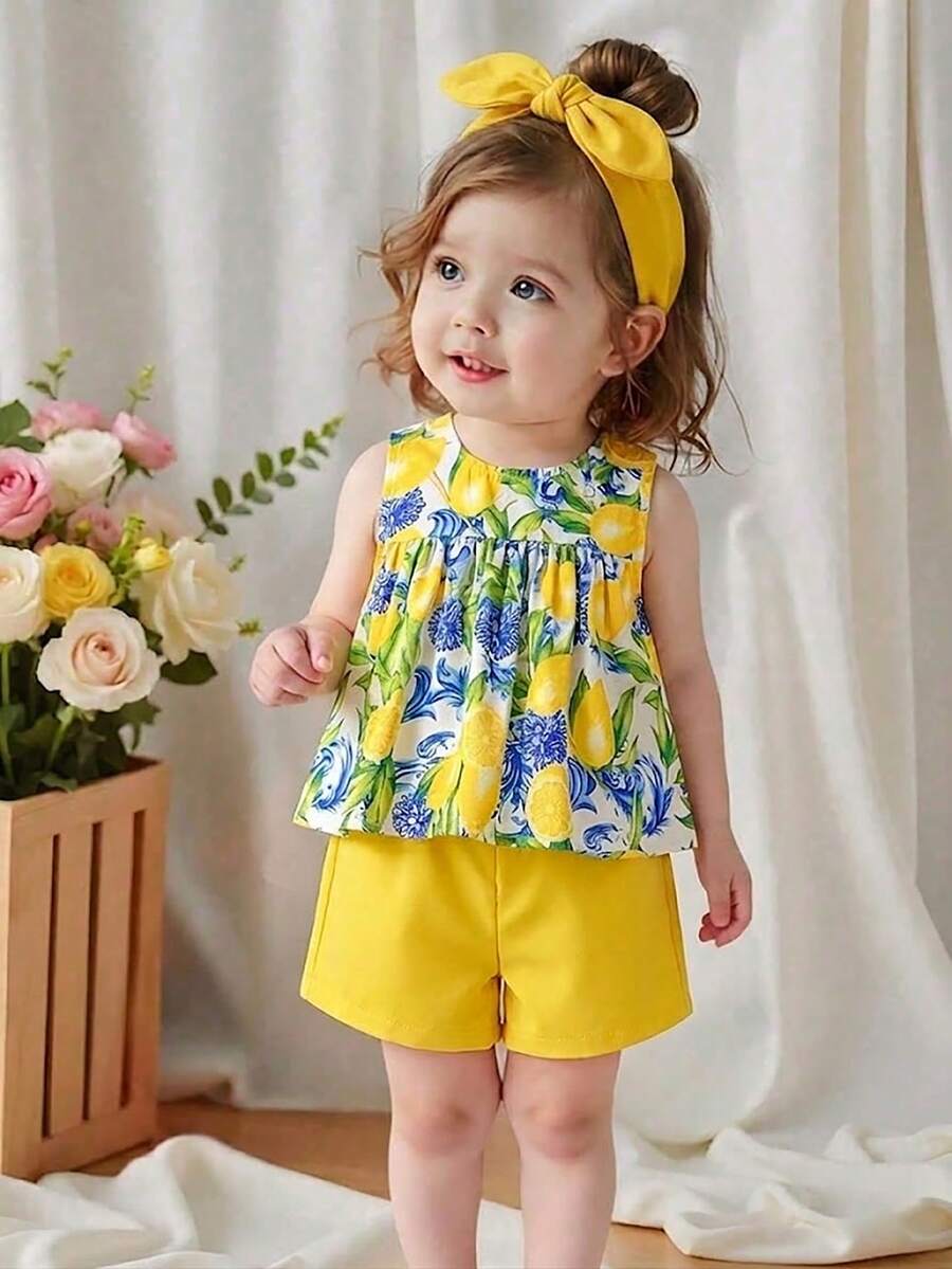 SHEIN Playful Pals 女童两件套夏季圆领无袖上衣搭配黄色短裤。清新黄白撞色，梭织面料，宽松版型。风格甜美、优雅、田园风，通体印有樱桃图案，活泼可爱。适合日常外出、上下学、参加派对、生日聚会、度假旅行等场合。 - 黃色 - 查看 1