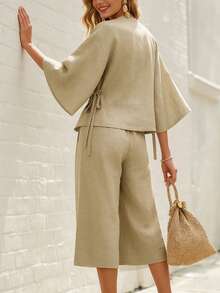 Breezaya Bộ đồ nữ mùa xuân/hè/thu tay loe phối nơ gồm áo cardigan và quần ống rộng, chất liệu sợi tre mềm mại, màu mơ nhạt, thích hợp mặc thường ngày/nghỉ dưỡng/đi biển. - Màu be - Xem 3