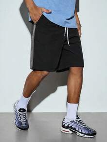 Modcrash Pantalones cortos deportivos casuales unisex de verano con cintura elástica, cordón y diseño de patchwork de color contrastante - Negro - Ver 1