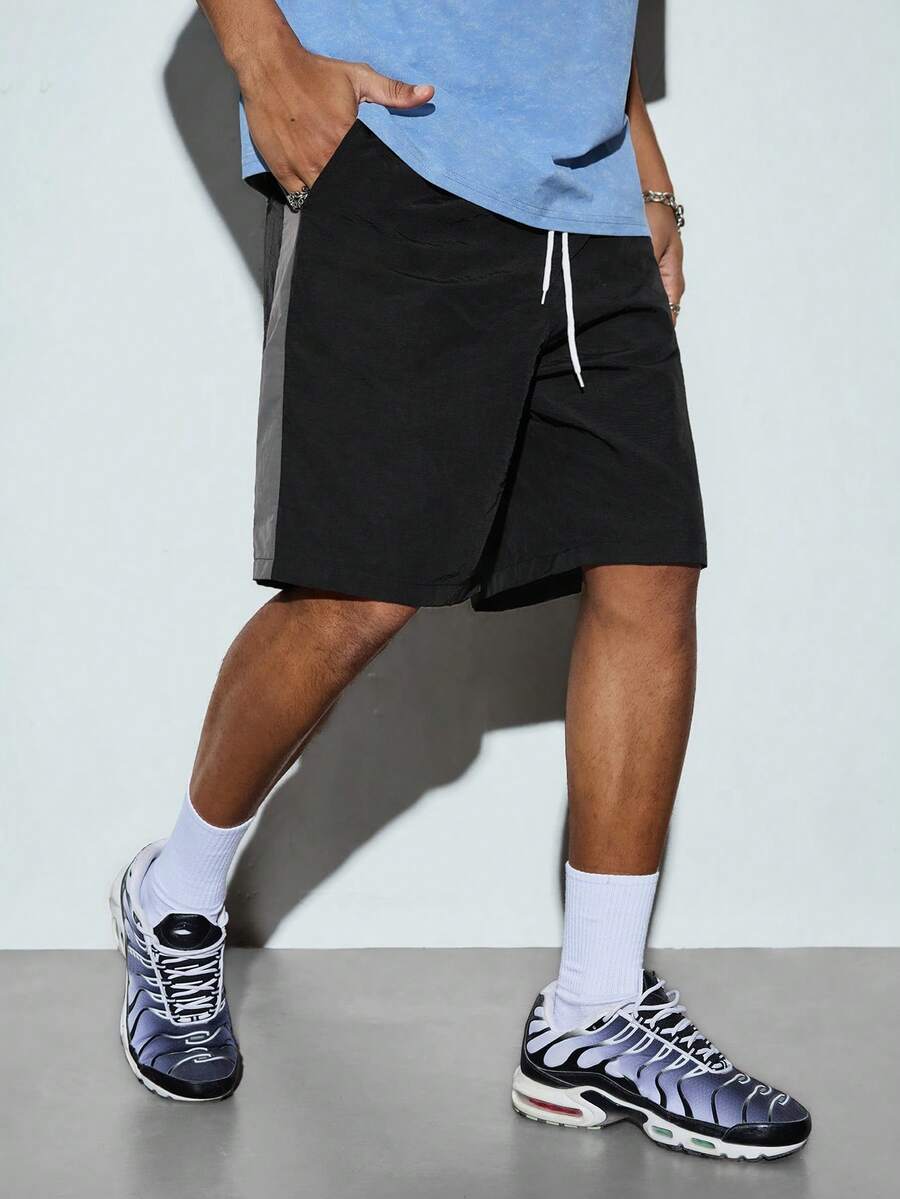 Modcrash Pantalones cortos deportivos casuales unisex de verano con cintura elástica, cordón y diseño de patchwork de color contrastante - Negro - Ver 1