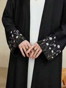 Al Najma Women's Floral Embroidered Elegant Long Sleeve Abaya - Black - View 2