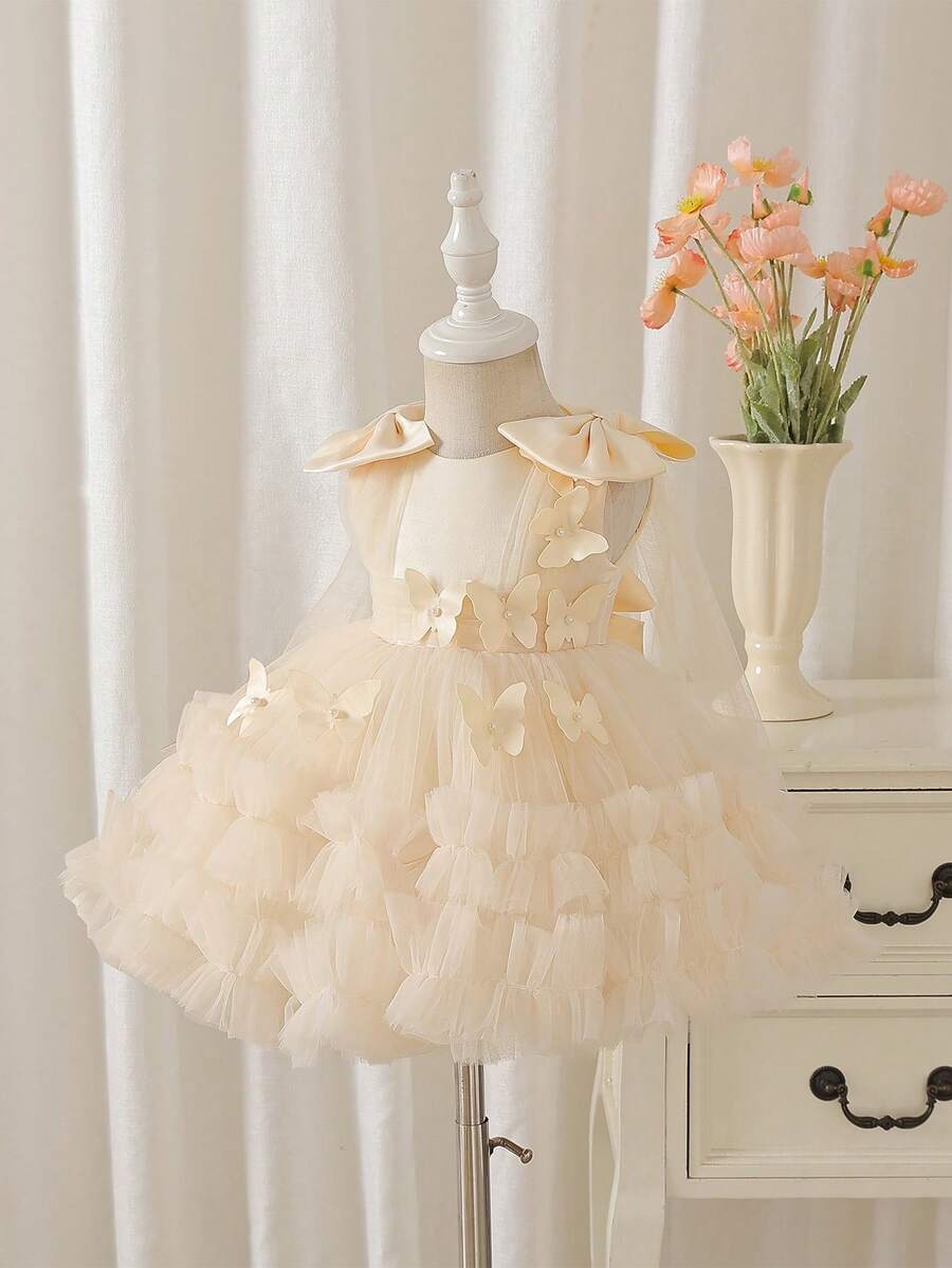 SHEIN Glamorique Kids 女童可爱薄纱泡泡裙,饰有蝴蝶结和珍珠,生日派对节日舞会公主裙 - 香檳色 - 查看 1
