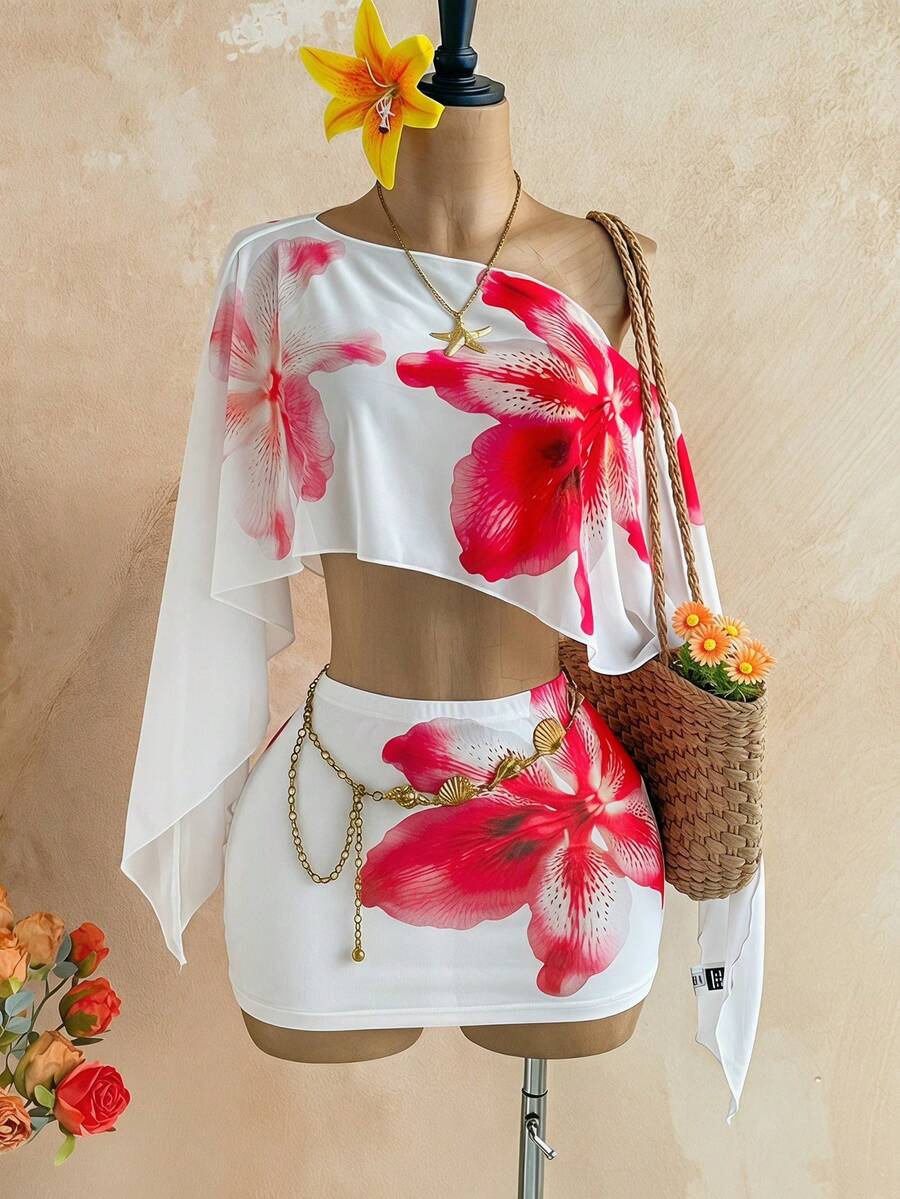 Soleia Bộ đồ gồm áo voan mỏng đính sequin vàng, kiểu dáng lệch vai, kết hợp với chân váy hoa xếp ly eo, thích hợp cho kỳ nghỉ, lễ hội âm nhạc, phong cách Bohemian. - trắng - Xem 1