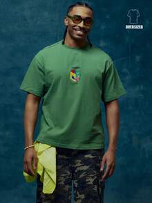 Musero Camiseta de cuello redondo oversize con gráfico centrado y marca, esencial de primavera/verano - Verde Oscuro - Ver 1