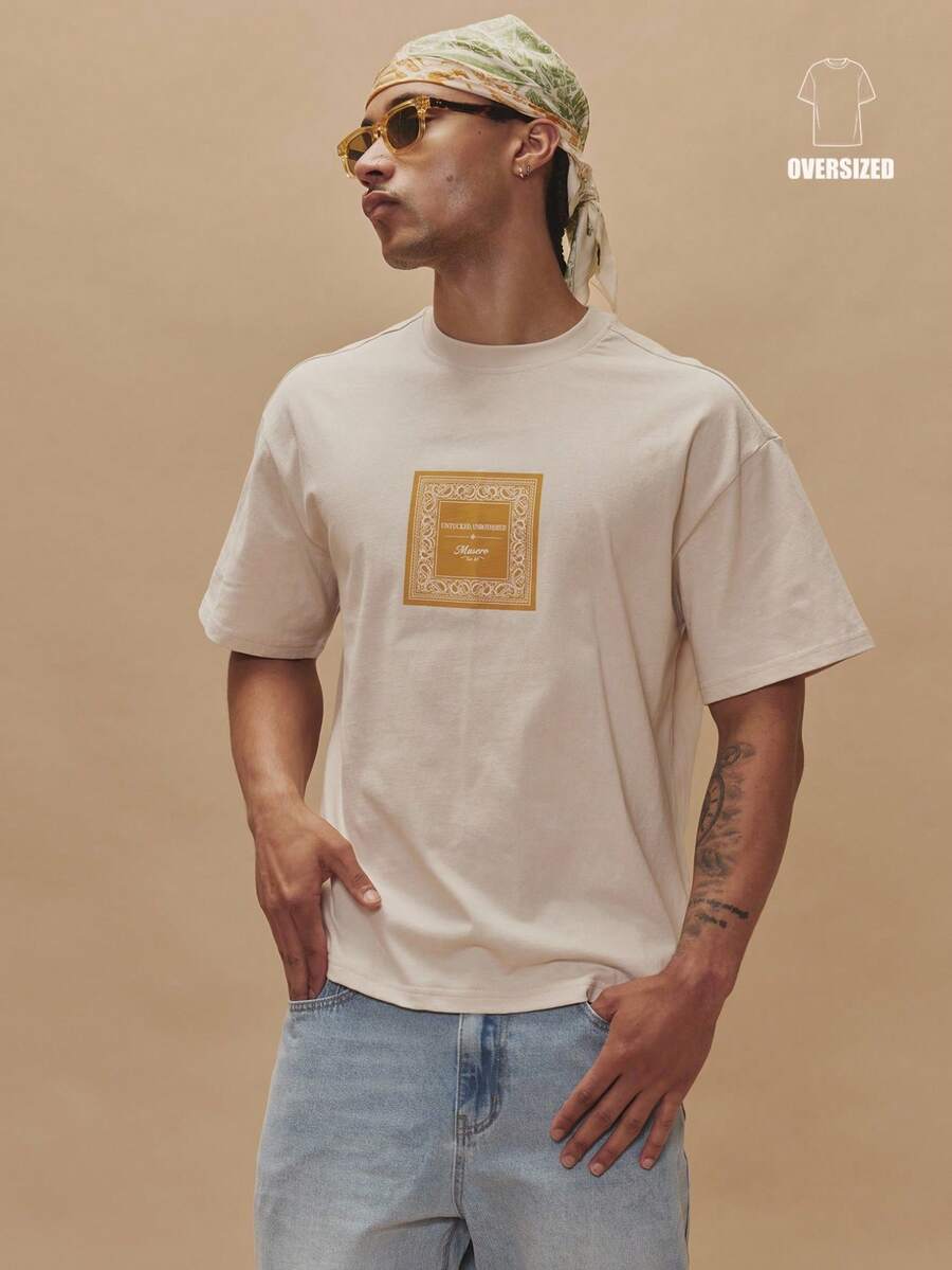 Musero Camiseta Essencial de Primavera e Verão com Gráfico Quadrado Impresso, Manga Curta Oversized, Ombro Caído e Decote Careca - Creme - Visão 1