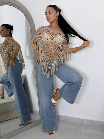 Vassilux Khăn choàng sequin tua rua đa năng, gợi cảm, khoét rỗng, thời trang, tôn dáng, thích hợp cho kỳ nghỉ biển, mẫu mới năm 2026, phong cách nghỉ mát biển. Trang phục đi nghỉ mát dành cho nữ, kỳ nghỉ hè, du lịch. Chiếc áo choàng dệt kim lấp lánh màu kaki này hoàn hảo cho kỳ nghỉ biển, hẹn hò, đi chơi thường ngày, lễ hội âm nhạc và tất cả các hoạt động nghỉ lễ. Thanh lịch và gợi cảm, chiếc áo choàng lấp lánh màu kaki này lý tưởng cho kỳ nghỉ biển, những chuyến đi biển và những buổi hẹn hò trên bãi biển.