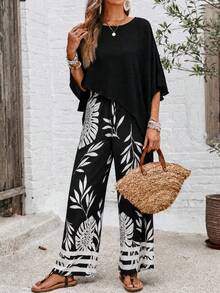 EMERY ROSE Damen Sommer Urlaubs Set mit einfarbigem Boot-Ausschnitt Top mit asymmetrischem Saum und botanisch bedruckter Hose, 2-teilig - Schwarz - Übersicht 4