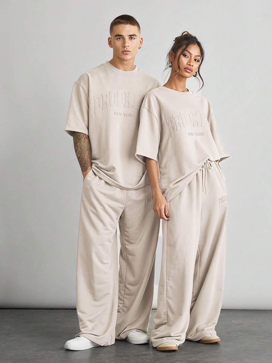NORVETH 2pcs/Set Men's Loose Dropped Shoulder Round Neck Short Sleeve T-Shirt And Drawstring Waist Straight Leg Pants Set - Apricot - View 1