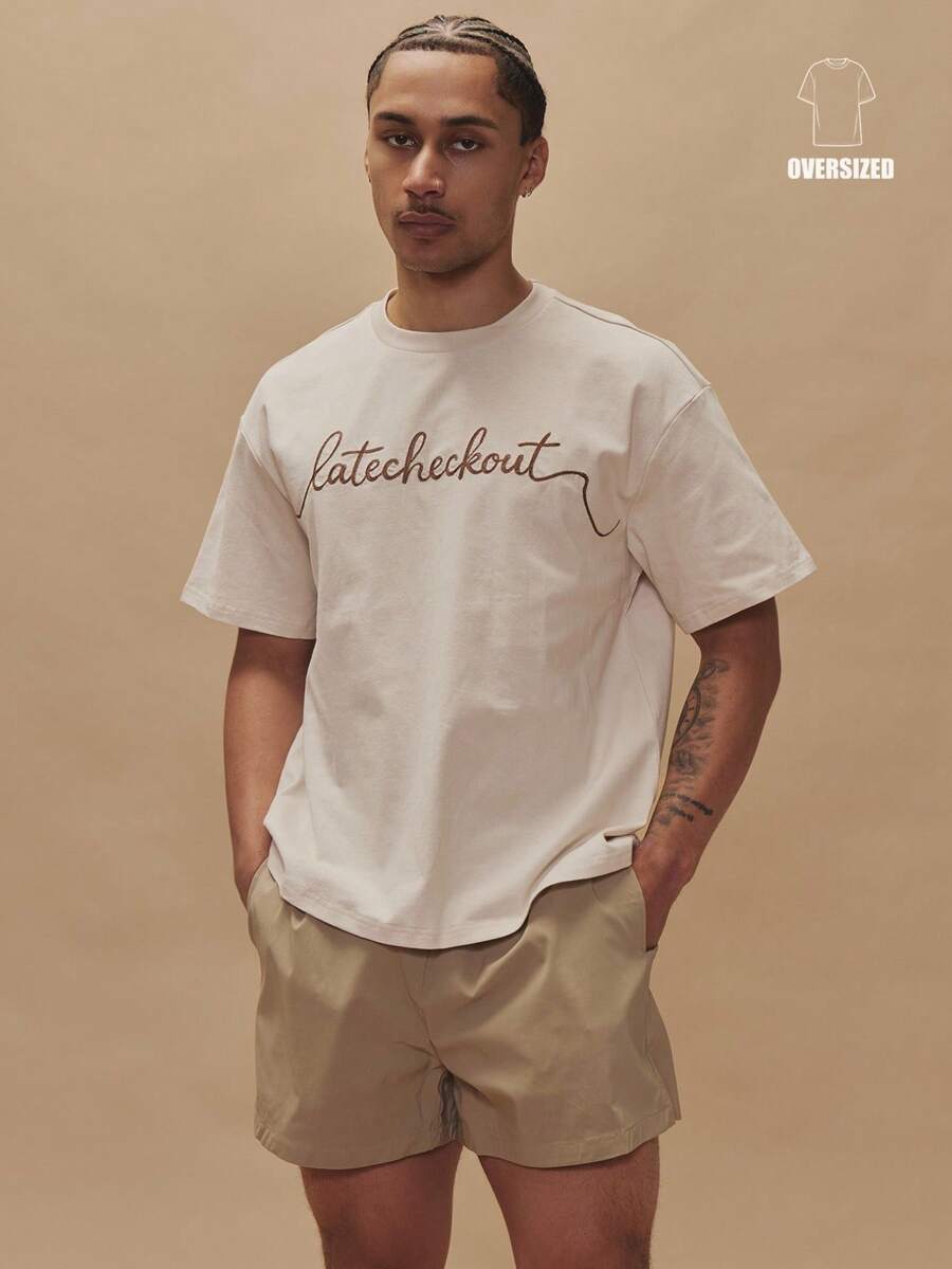 Musero Oversized Crew Neck Short Sleeve Large Front Chest Embroided "LATE CHECKOUT" Patch Detailing Spring Summer Essentials Holiday - White - View 1