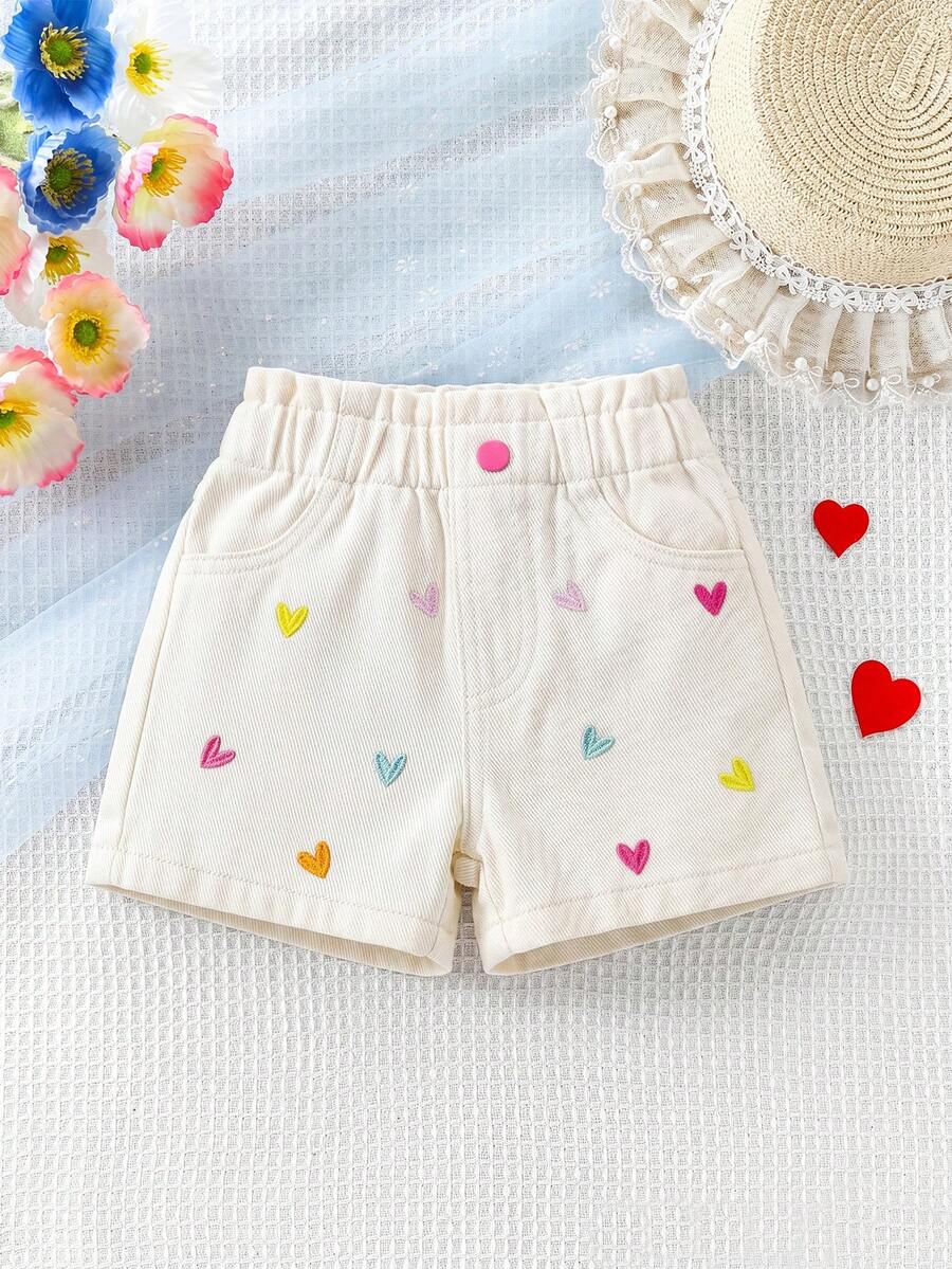 SHEIN Playful Pals 女婴牛仔短裤,夏季新品,时尚休闲风,浅杏色,弹性腰带荷叶边设计,彩色刺绣爱心图案,直筒宽松版型,柔软棉质牛仔面料,舒适亲肤,百搭日常穿着,适合夏季度假、音乐节、派对等各种场合。 - 杏色 - 查看 1