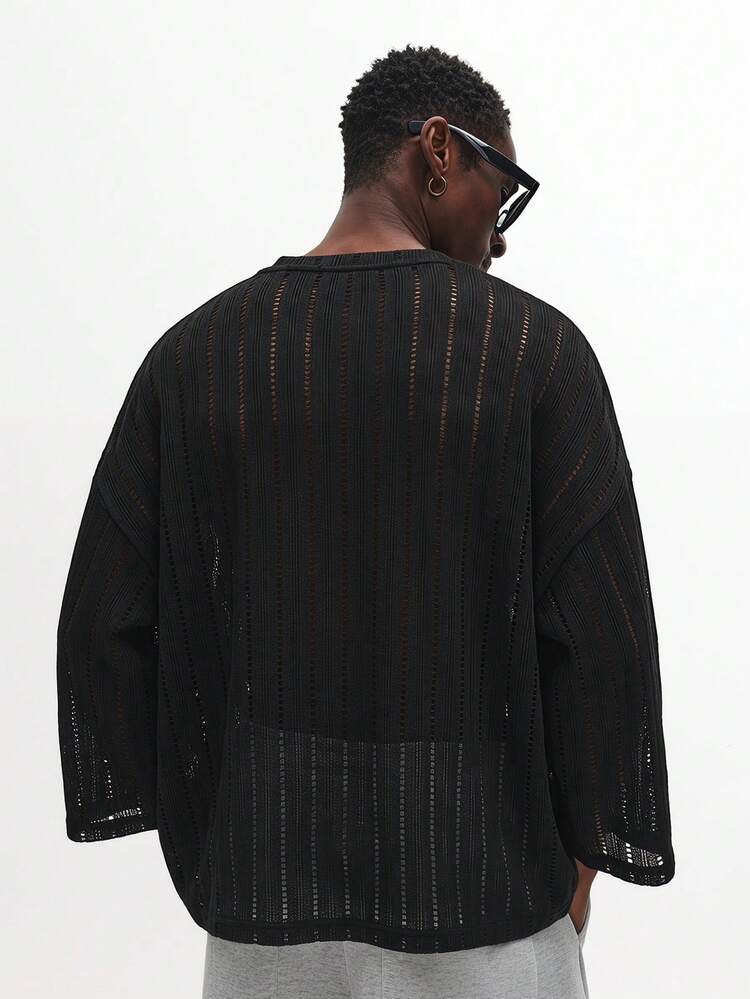 Pull oversize à col rond en tricot semi-transparent à rayures transparentes et manches longues