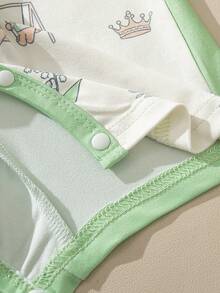 Souflis Souflis 这款男女宝宝连体衣印有小熊和游乐场图案，适合夏季穿着，可爱的小熊图案让宝宝看起来更加萌趣十足。这款连体衣也适合恐龙宝宝，是一款百搭的中性服装。 - 彩色 - 查看 5