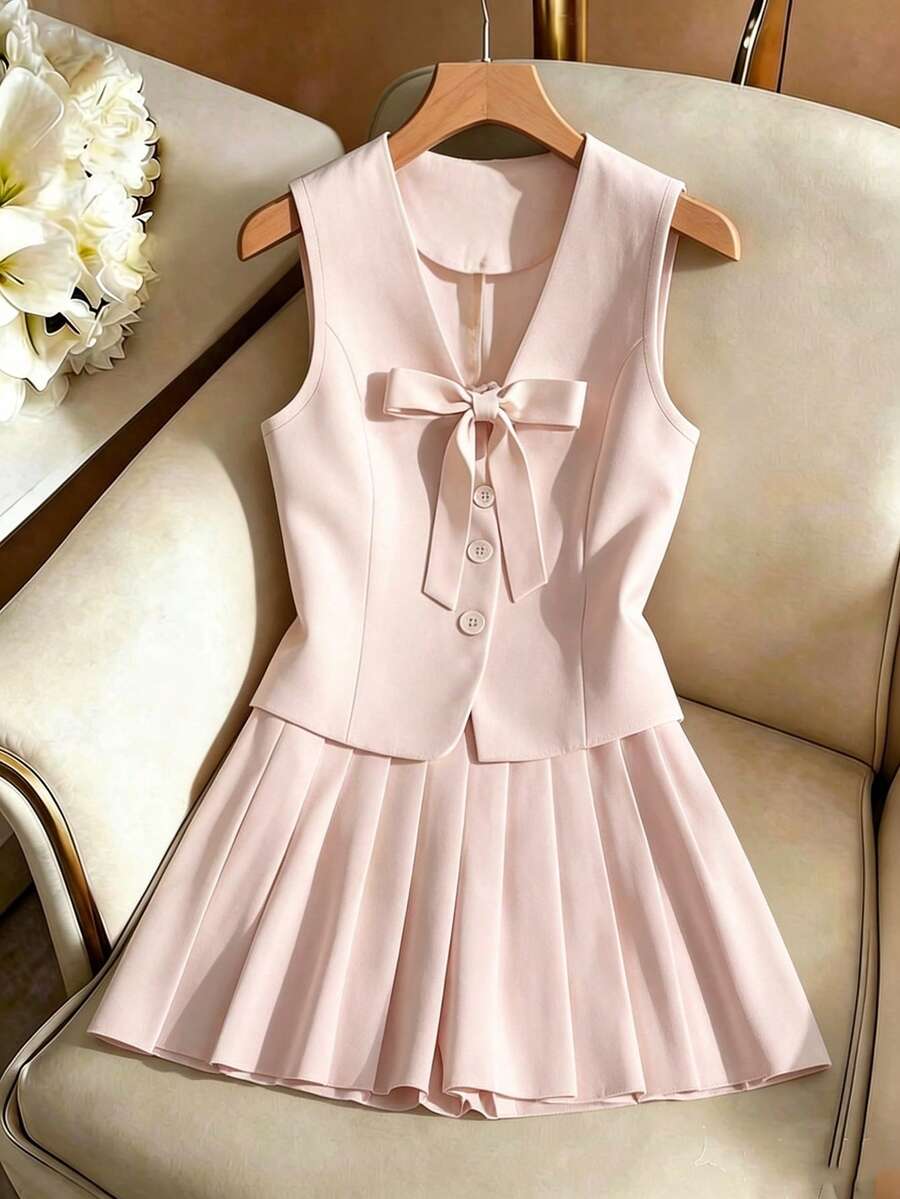 GlowEve 女士两件套服装,夏季新款优雅休闲蝴蝶结系带无袖衬衫和短款百褶裙套装 - 粉色 - 查看 1