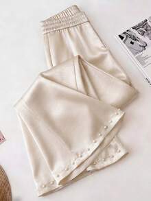 Elegantrix Calça pantalona de cetim com detalhes em pérola, ideal para encontros casuais, festas e para o dia a dia, perfeita para a primavera/verão. - Damasco - Ver 1