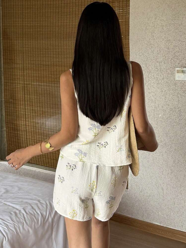 Women Textured Floral Print Tie-Up Top And Shorts Pajama Set