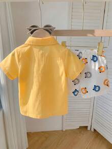 SHEIN Bộ 2 món cho bé trai và trẻ chập chững họa tiết gấu vui nhộn, áo ngắn tay mở trước và quần short, màu vàng pastel, phong cách thường ngày mùa hè đi dạo phố - Nhiều màu - Xem 2