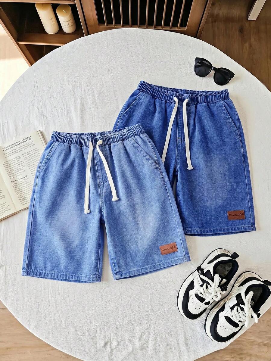 SHEIN 2Pcs Tween Boy Fashion Casual Vintage Cool Street Labeled Blue And Black Loose-Fitting Denim Shorts, 2-Piece Set For Dailywear And Spring To Summer Rave Festival And Streetwear Clothes New SS26 Fashion - Multicolor - View 1