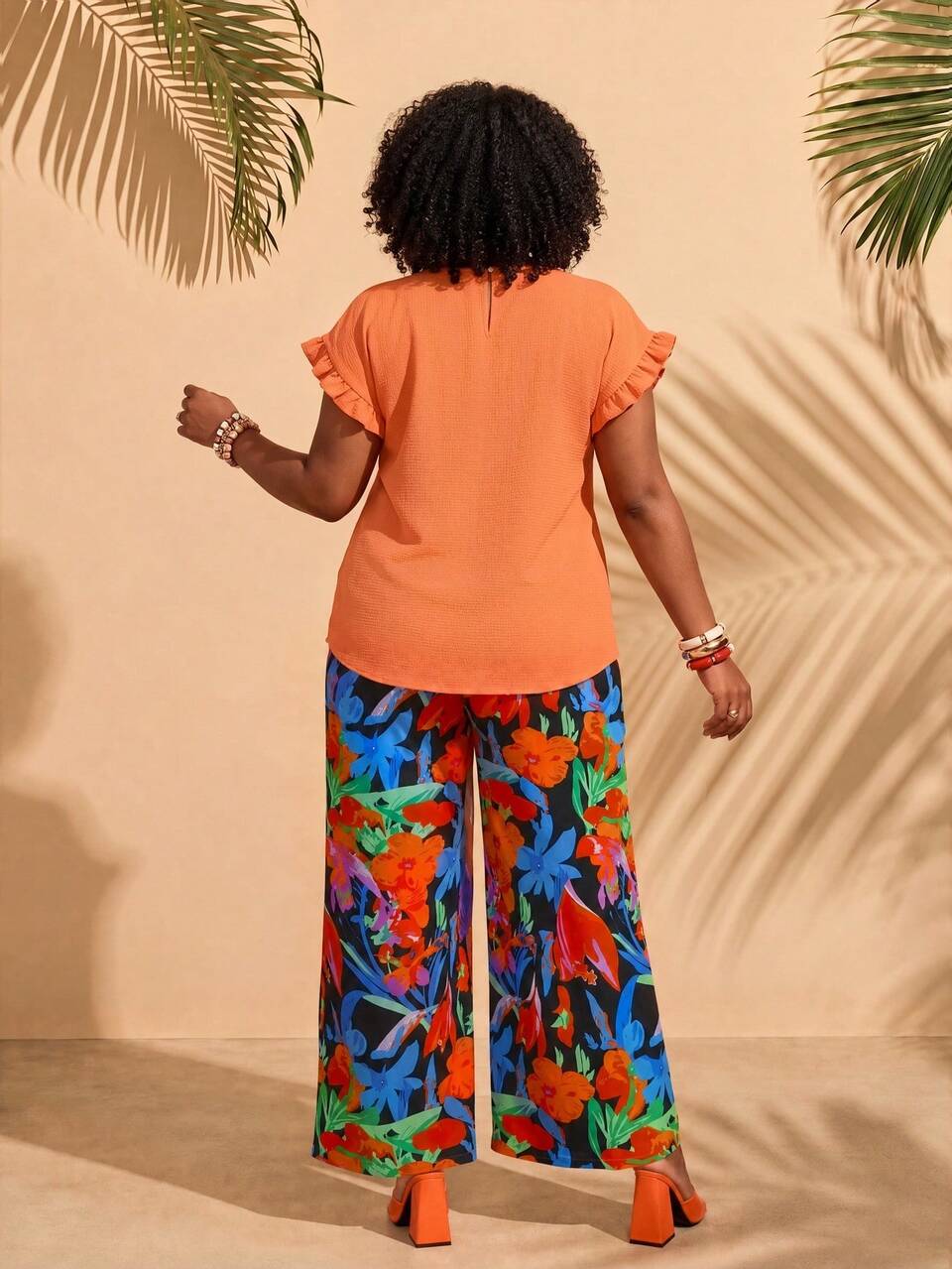 Plus Size Women's Summer Beach Vacation Solid Color Ruffle Sleeve Top And Botanical Print Wide Leg Pants 2 Pieces Set Burnt Orange Black Boho Tropical