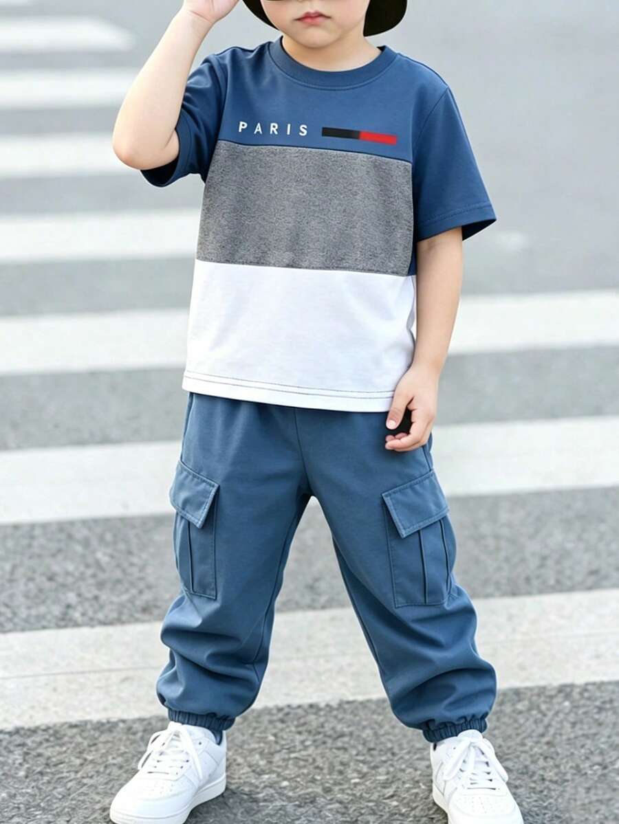 小男孩酷炫趣味英文標語圖案設計,時尚圓領短袖三色拼接滿版印花T恤 & 工裝褲套裝,適合假期聚會 & 派對,春/夏輕鬆舒適,夏季必穿之選,時尚休閒穿搭,春/夏街頭風,外出休閒穿搭,返校派對,適合戶外野餐、街拍、校園、假期、禮物使用 春/夏 - 彩色 - 查看 1