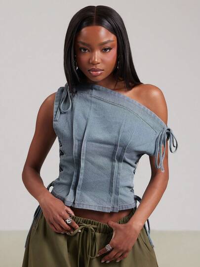 NYA SZN Áo blouse denim nữ dáng ngắn, vai bất đối xứng, buộc dây, nhún xếp nếp
