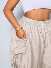 SOLERSUN Plus-Size Women's Solid Color Casual Loose-Fitting Drawstring Shorts With Large Pockets And Elastic Waistband. Suitable For Everyday Casual Wear, Commuting, And Vacations In Spring And Summer. Street Style, Perfect For Beach Vacations And Picnics. Comfortable, Loose-Fitting, Wide-Legged Mid-Length Shorts. - Apricot - View 2