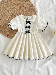 SHEIN Vintaside Kids 新生女嬰洋裝 - 春夏系列 - 杏色短袖蝴蝶結款式，甜美可愛女嬰洋裝，公主風袖子，飄逸裙擺，針織提花面料，優雅嬰兒洋裝，適合日常穿著，可用作嬰兒里程碑禮物 - 杏色 - 查看 5