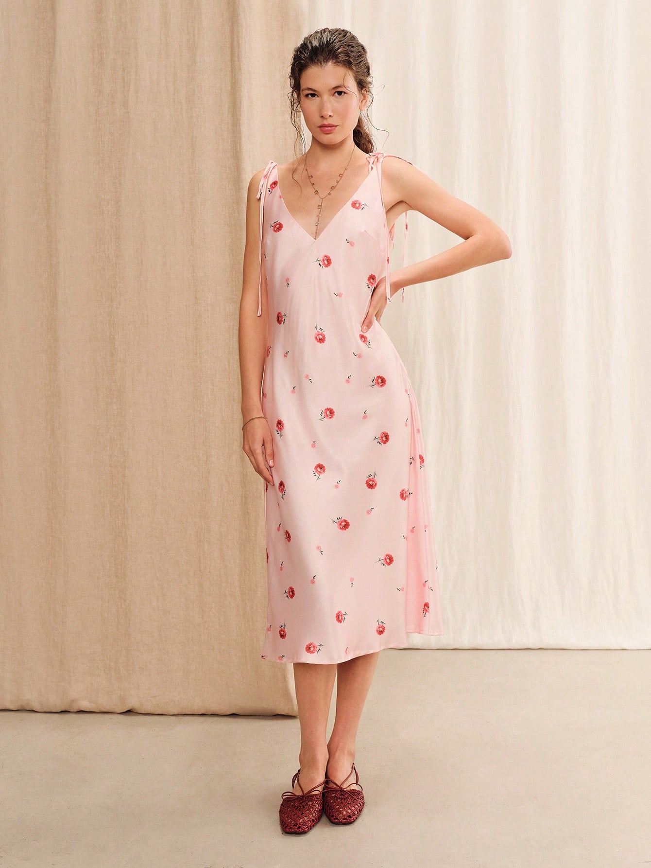 Flowy Pale Pink Satin Midi Dress With Floral Print, Tie Straps, And A V-Neckline Summer Vacation