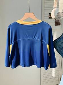 Comfortcana Áo thun nữ ngắn tay cổ chữ V đội tuyển bóng đá quốc gia Colombia mùa hè, áo croptop casual in chữ phối màu tương phản, tay raglan dệt kim, phong cách retro, preppy, cổ điển, thời trang, trẻ trung và street style. Chất liệu vải mềm mịn thoải mái, lý tưởng cho ngày thi đấu. Áo thun thể thao thời trang World Cup 2026 ngày thi đấu phong cách bóng đá đường phố - Nhiều màu - Xem 2