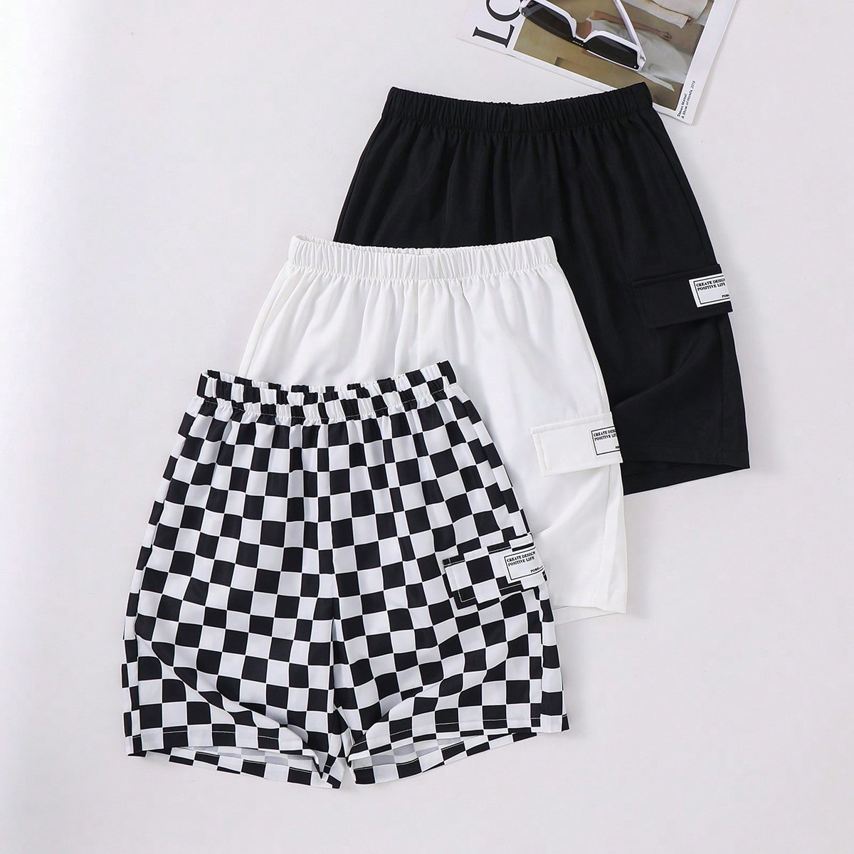 Set de 3 pantalones cortos casuales para niños y preadolescentes con estampado de cuadros sueltos, pantalones cortos negros, pantalones cortos blanco