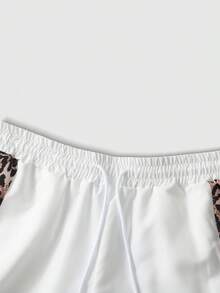 PAVTROS Bộ 2 món đồ thể thao nam phong cách đường phố cổ điển, áo sơ mi ngắn tay và quần short dây rút, áo sơ mi dáng rộng cài nút và quần short cạp chun, bộ đồ thể thao phối họa tiết da báo, phong cách retro năng động, tạo cảm giác thon gọn, dáng rộng, tối giản dành cho giới trẻ thành thị, thoải mái và thời trang cho đi làm và đi học, tín đồ thời trang, trang phục đôi unisex, quà tặng ngày lễ, quà tặng bạn trai. - trắng - Xem 7
