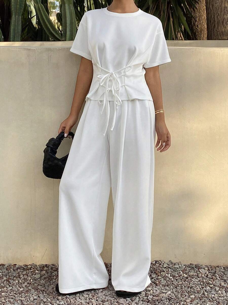 Livesso Women's Solid Color Round Neck Short Sleeve Tassel Design T-Shirt And Pants Casual 2-Piece Set - White - View 1
